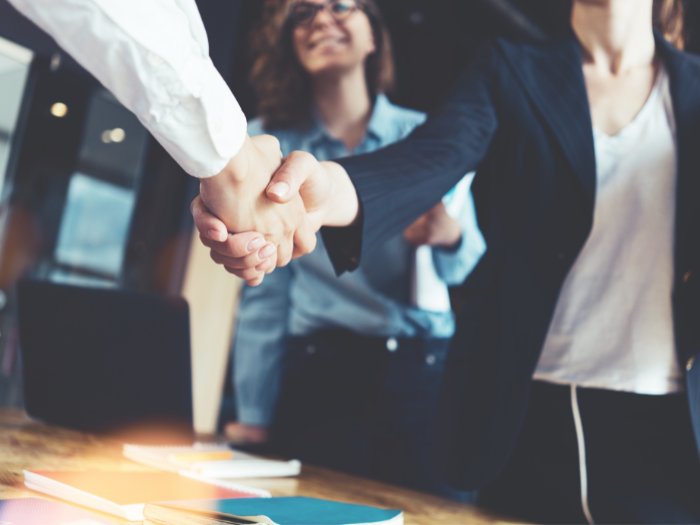 Business partners hand shaking