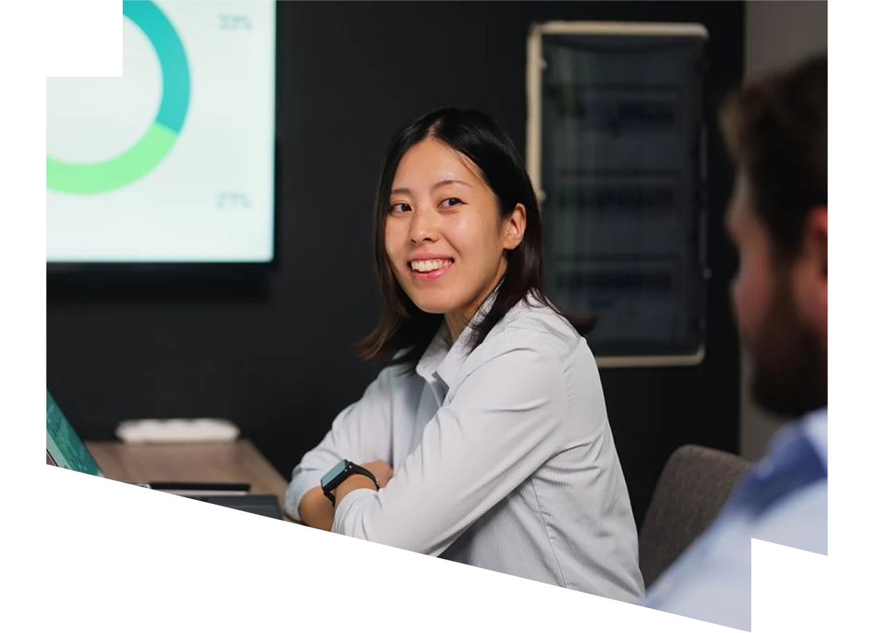 Woman presenting data to colleagues